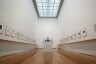 Framed works in a gallery - ©Yosuke Ota / Unsplash